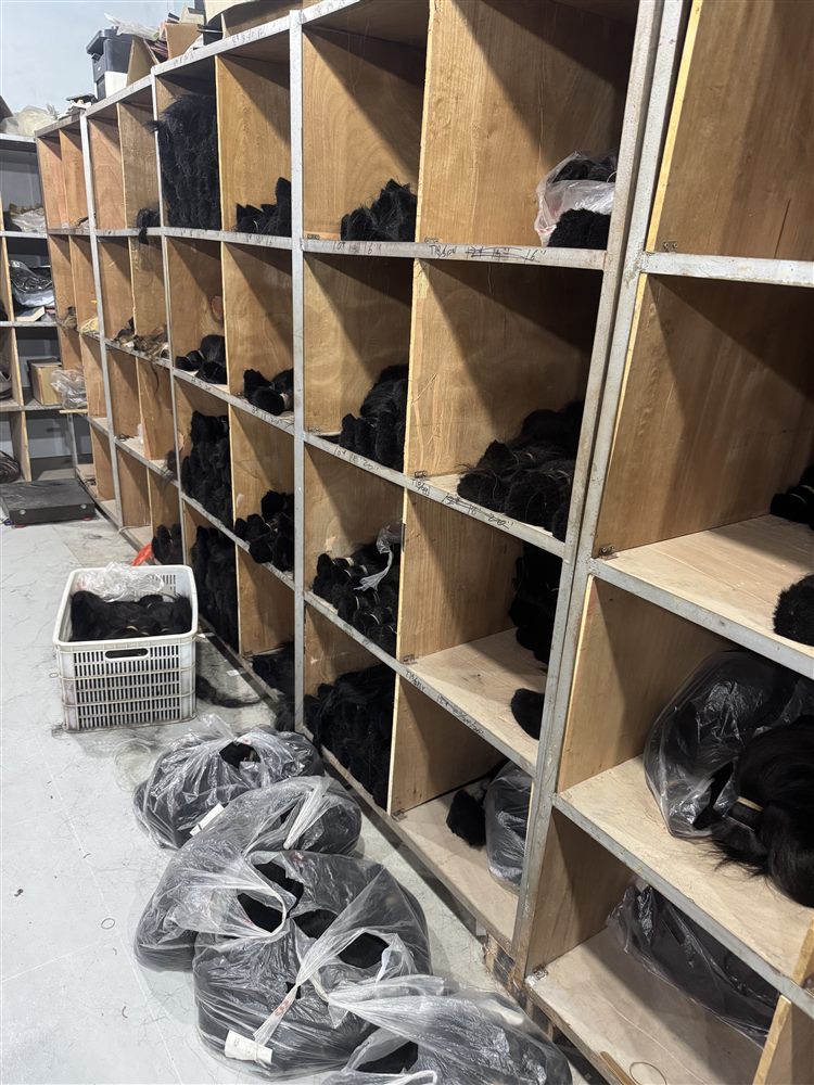 Warehouse shelves stocked with hair bundles
