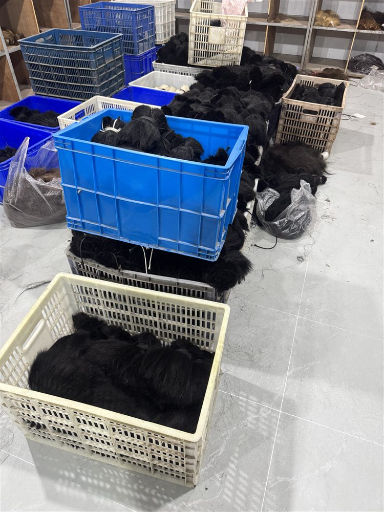Crates of raw hair bundles in stock